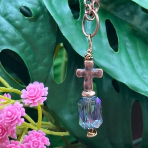Boho copper cross necklace with an iridescent blue-purple AB crystal pendant