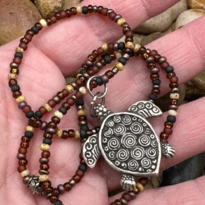Close-up of Czech Picasso glass seed beads on a Handmade Boho Brown Neutral Czech Picasso Glass Seed Bead Necklace.