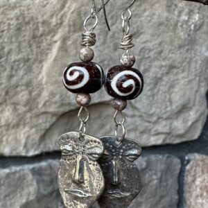 Hand carved tribal bone mask earrings with sterling silver ear wires