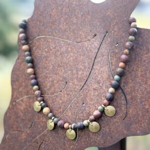 Handcrafted Earthbound necklace featuring matte Picasso jasper, copper beads, and tribal shield charms by Boho By Shae